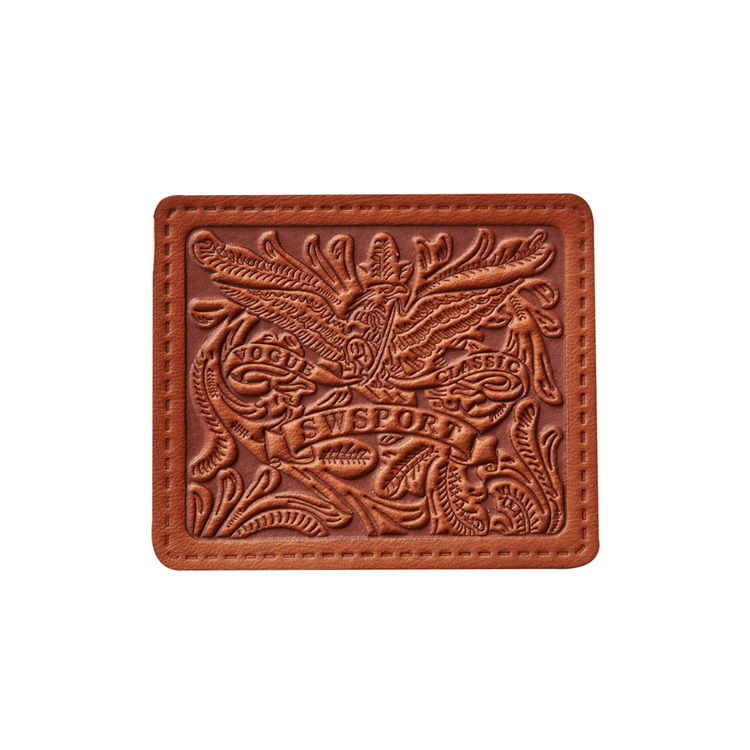 Master the heat press technique for leather patches. 